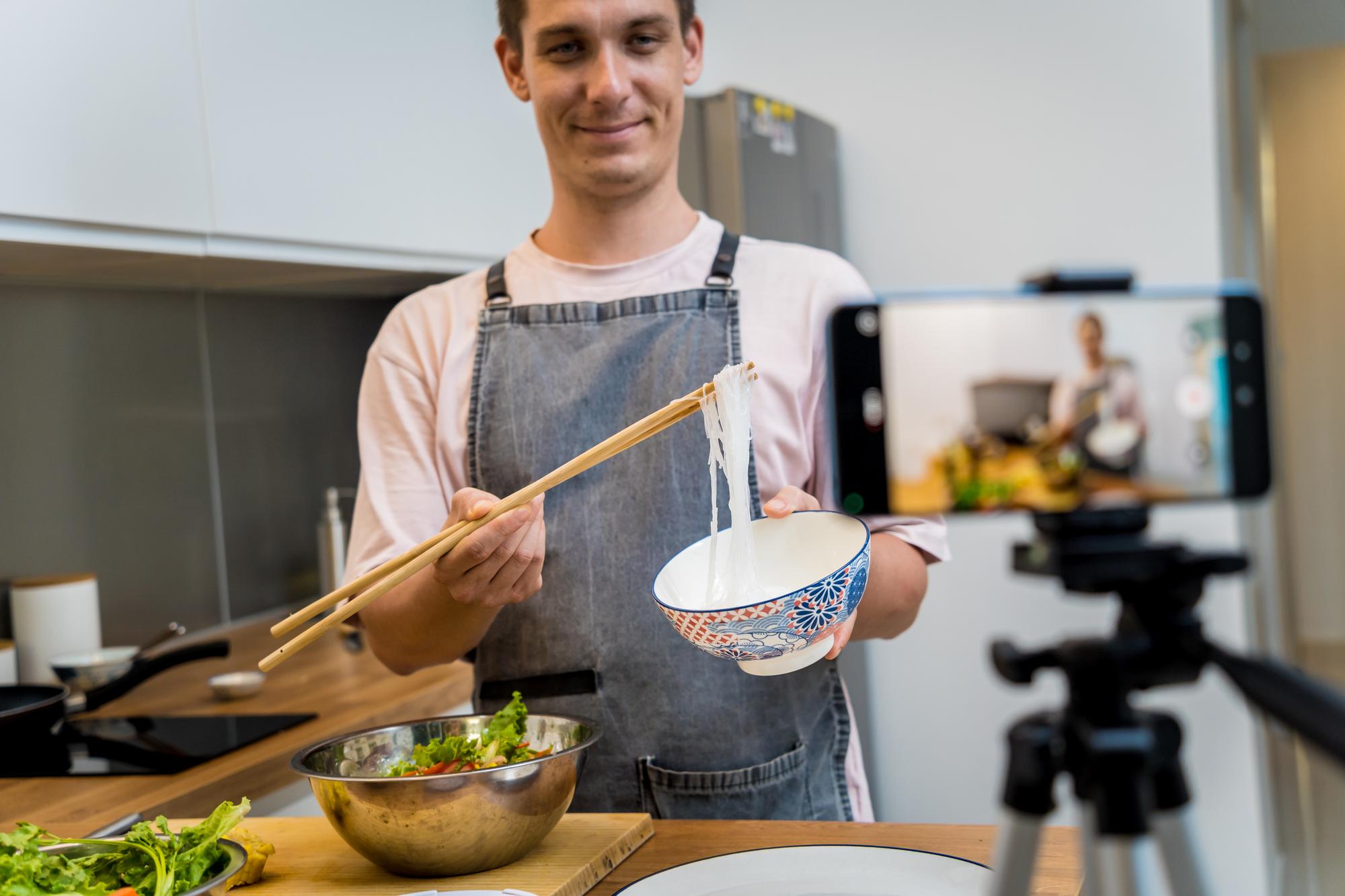 Instructor in studio kitchen with modern equipment